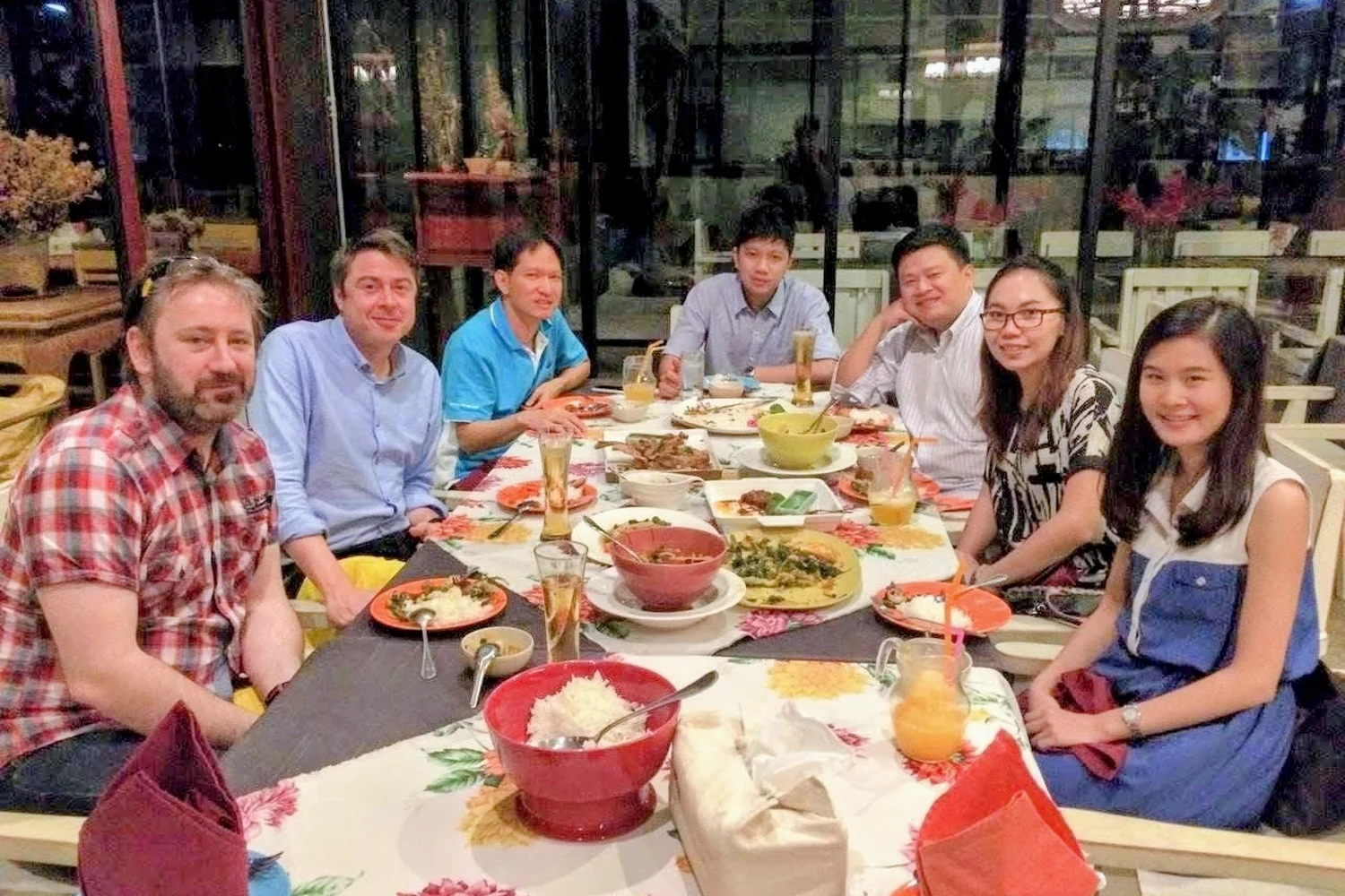 Thai and UK collaborators at a group dinner